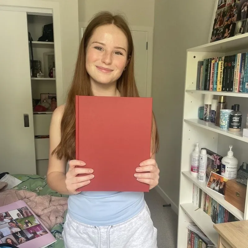 Sofia Reid with her Photouria book